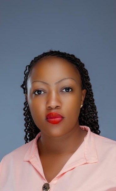 About Us 4 Mabala Flavia, Secretary of TDD Foundation